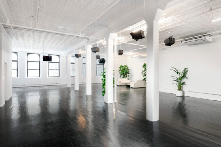Artist Loft is double exposure loft event space located in Tribeca. This sleek, sprawling interior features dark polished wood floors, bright white walls, high ceilings, industrial columns, & numerous windows providing natural light. Ideal for private events or photo and video shoots complete with a glass office.