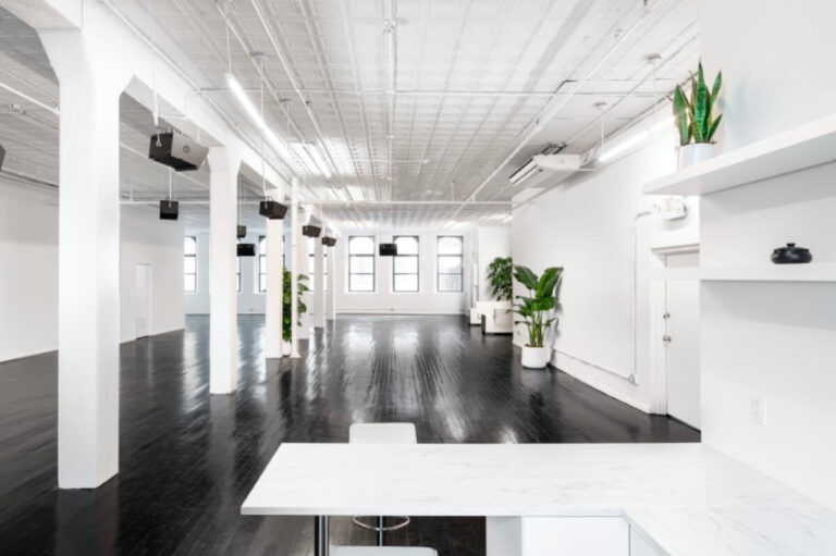 Artist Loft is double exposure loft event space located in Tribeca. This sleek, sprawling interior features dark polished wood floors, bright white walls, high ceilings, industrial columns, & numerous windows providing natural light. Ideal for private events or photo and video shoots complete with a glass office.